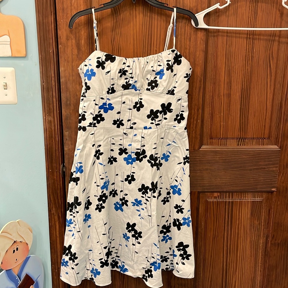 Ladies white sundress with black and blue flower design